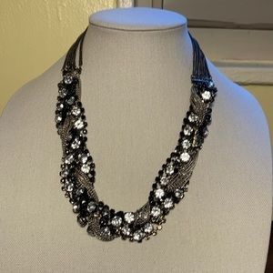 Magnificent Chunky Silvertone multi-strand and large rhinestone twist neckkace
